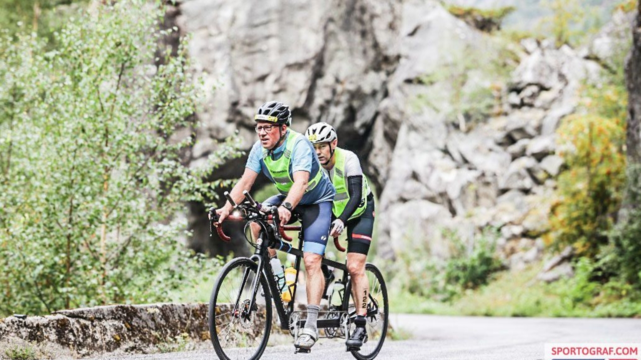 Iain Dawson on the bike leg at the 2024 Norseman Triathlon along with guide Baard Ginsberg (Photo - NXTRI/Sportograf).