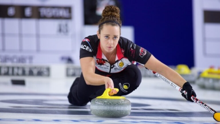 Canadian curler Joanne Courtney in action