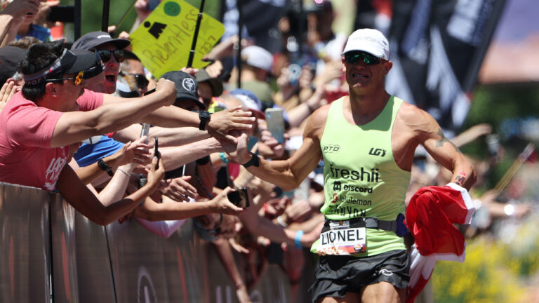 ST GEORGE, UTAH - MAY 07: Lionel Sanders of Canada reacts as he approaches the finish line to place second during the 2021 IRONMAN World Championships on May 07, 2022 in St George, Utah. (Photo by Tom Pennington/Getty Images for IRONMAN)