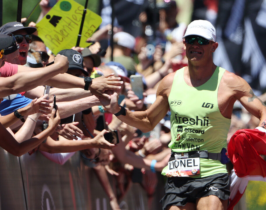 ST GEORGE, UTAH - MAY 07: Lionel Sanders of Canada reacts as he approaches the finish line to place second during the 2021 IRONMAN World Championships on May 07, 2022 in St George, Utah. (Photo by Tom Pennington/Getty Images for IRONMAN)