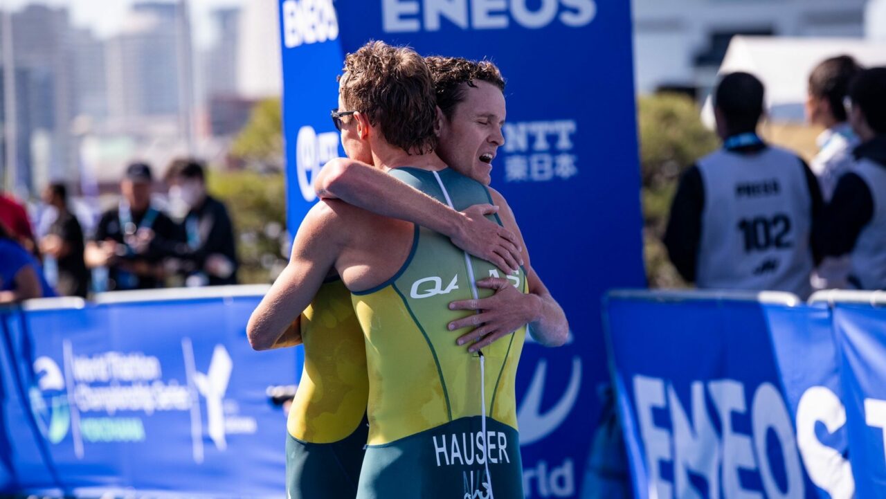 Luke Willian and Matt Hauser embrace after WTCS Yokohama podium.