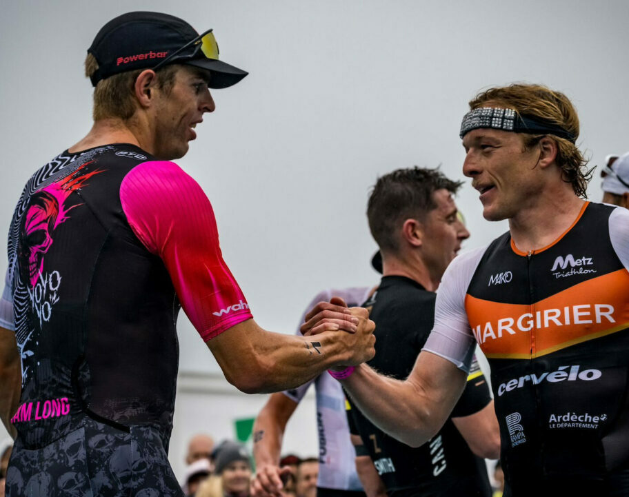 Sam Long and Mathis Margirier shake hands after a battle on the run.