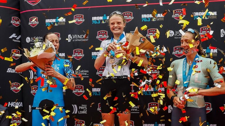 Womens podium IRONMAN 703 Les Sables Bartlett Madsen Curran photo credit IRONMAN