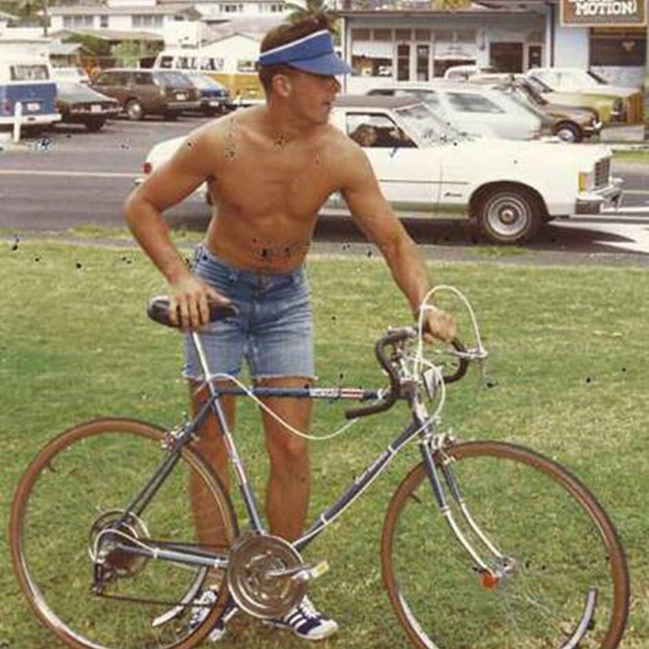 Dave Orlowski at the inaugural Ironman race in 1978, heading off on the bike wearing denim cut off shorts.